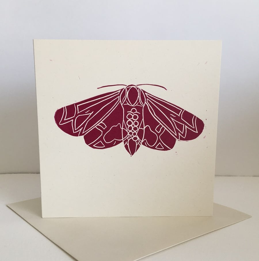 'Moth' hand printed linocut card, burgundy