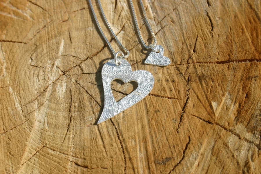 Mummy and Me. Two fine silver patterned heart pendants