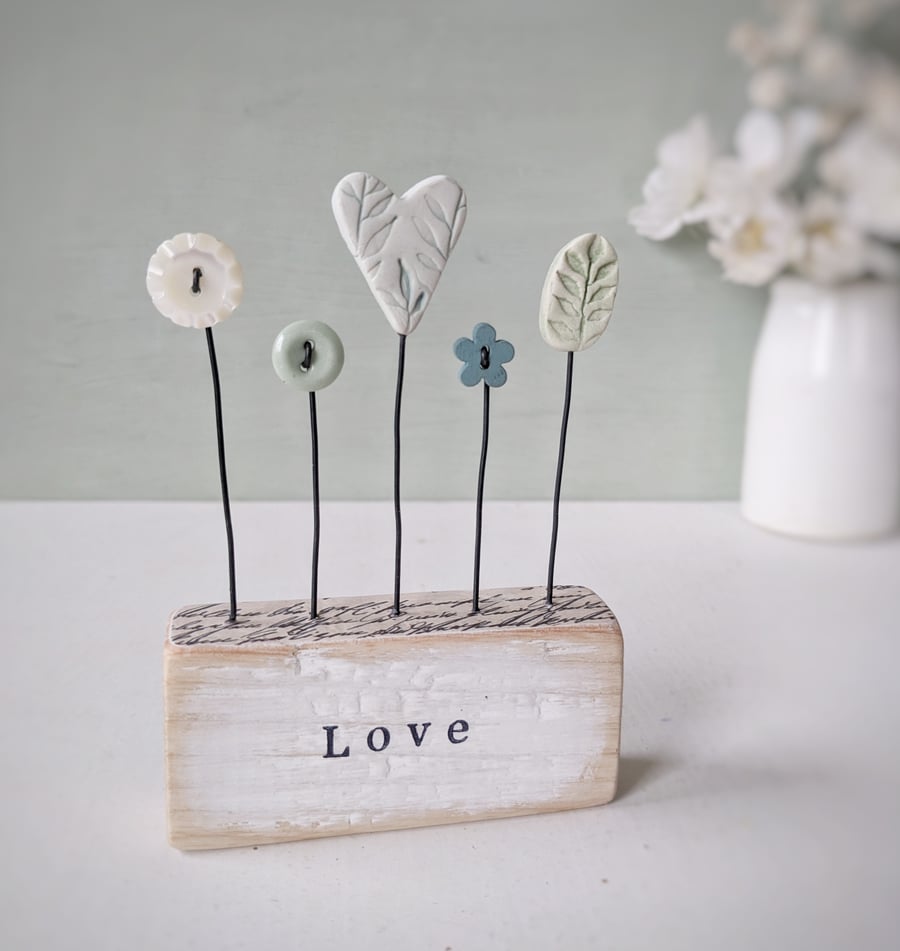 Heart and Button Flowers in a Painted Wood Block 'love'