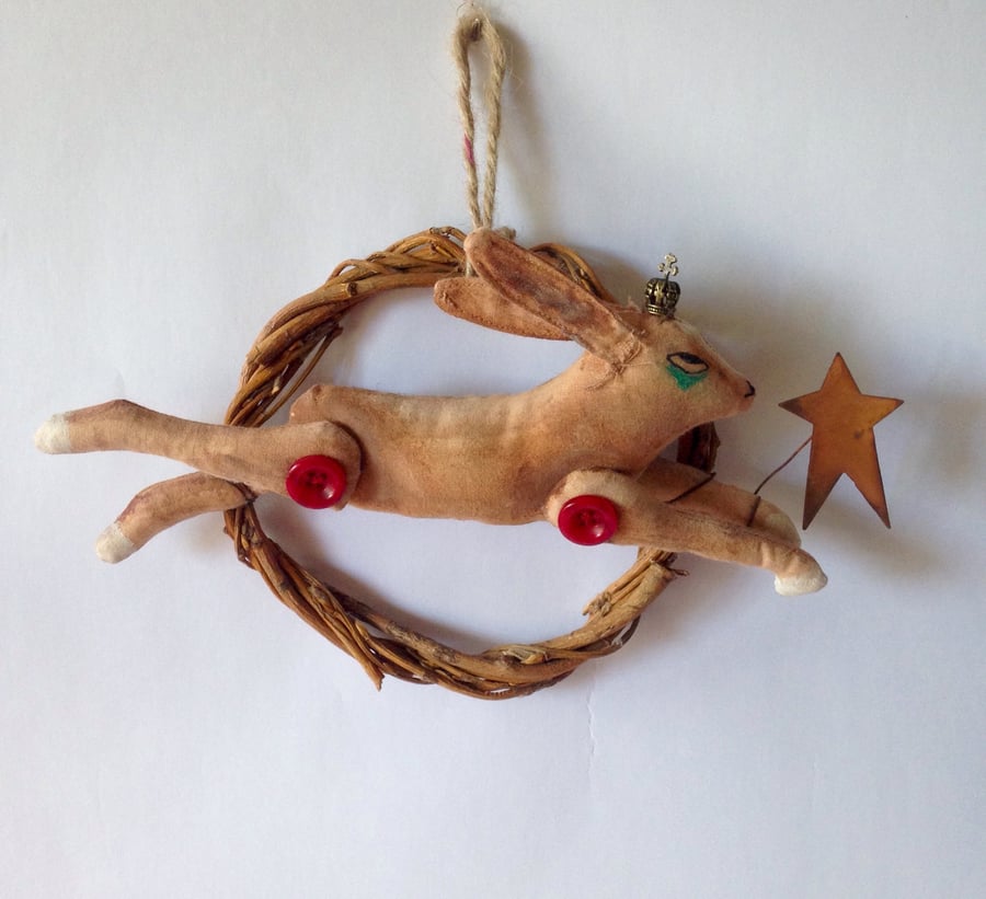 Christmas decoration hare leaping on willow