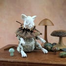 'Porcini’, a porcelain and textile mouse skull doll.