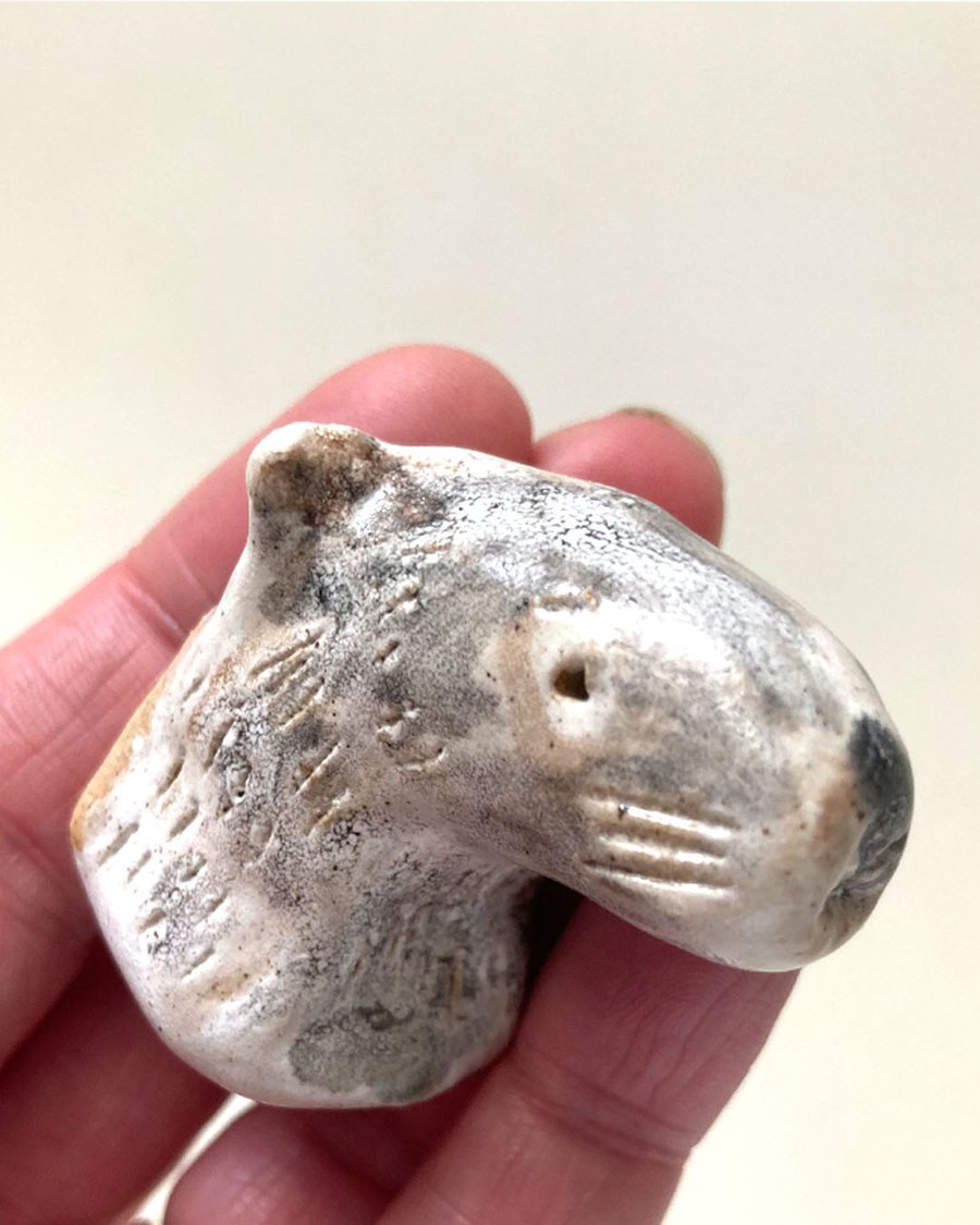 Ceramic otter head