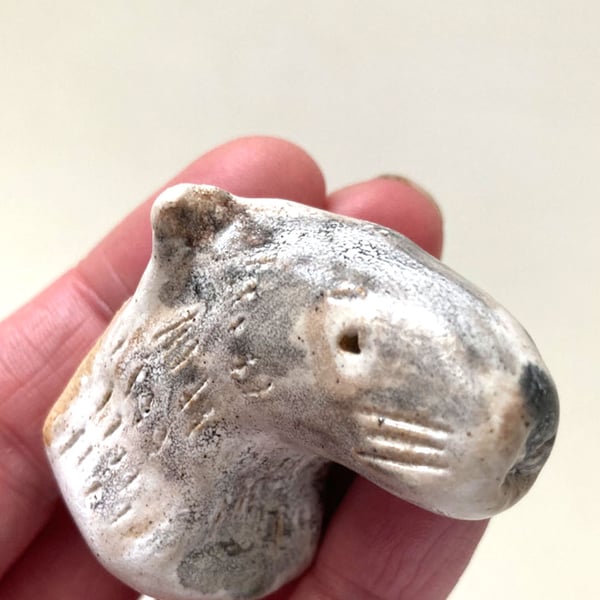 Ceramic otter head