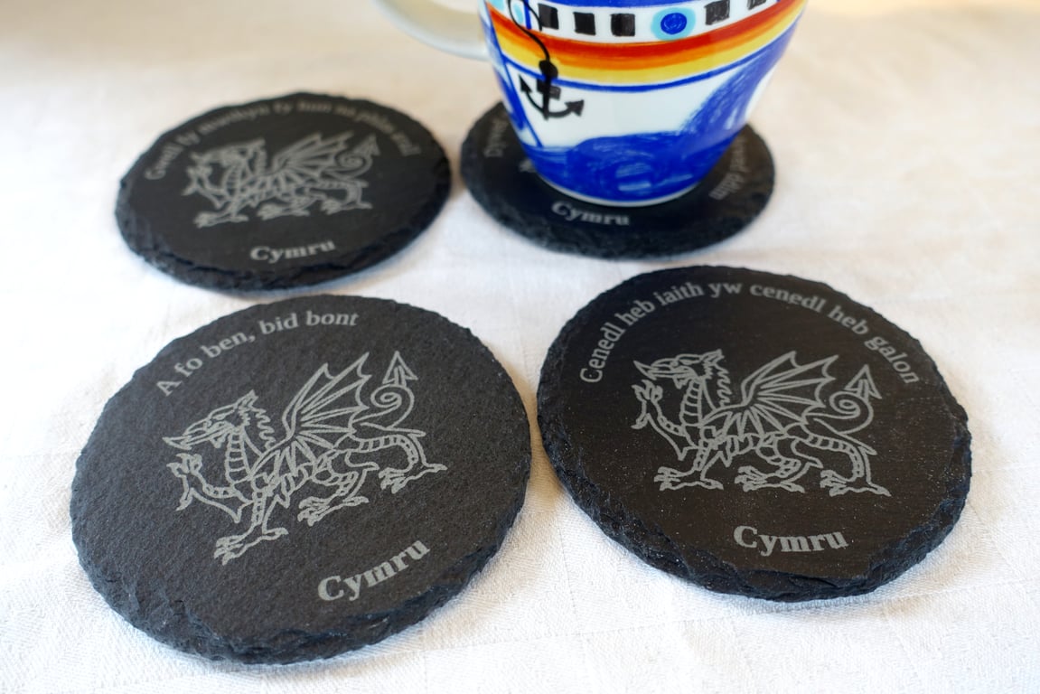 Slate coasters. Welsh sayings with dragon. 
