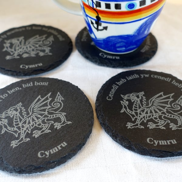 Slate coasters. Welsh sayings with dragon. 