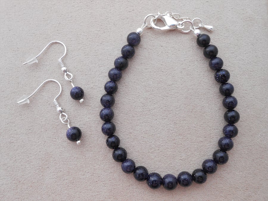 Blue goldstone jewellery set for adults.