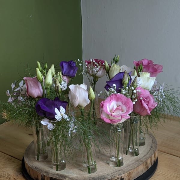 Centrepiece Vase with small glass bottles for flower display or propogation