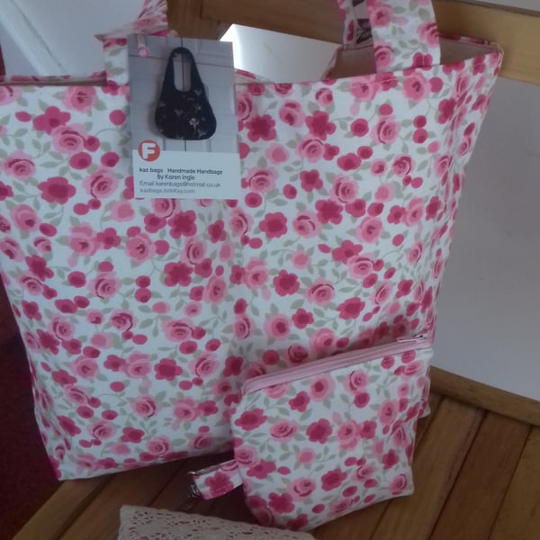 Tote bag with matching accessories in pink  rose floral fabric.