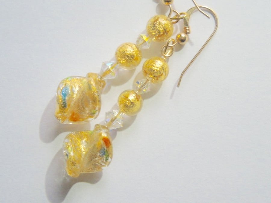 Gold Murano glass earrings with Swarovski crystal and gold filled hooks.