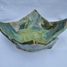 Pottery origami inspired folded ceramic bowl in unique green glazes