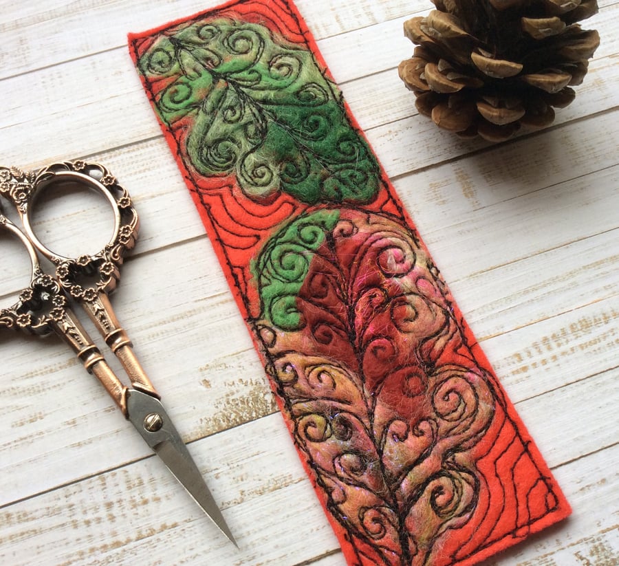 Embroidered leaf bookmark.