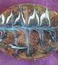 brooch - oval scrolled white and blue-grey on black over clear enamel - Image 2