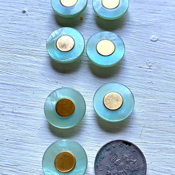 7 green and gold vintage buttons