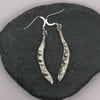 Real seed pods preserved in silver dangly earrings!