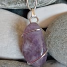 Wire-wrapped natural amethyst tumble stone