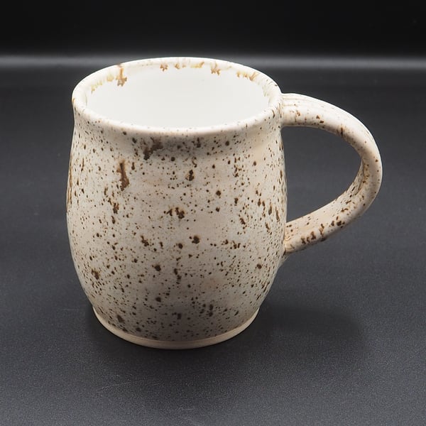 Large stoneware pottery mug finished in multi-colour brown cream glaze.
