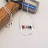 Rainbow sapphire, ruby and emerald necklace, Hammered sterling silver