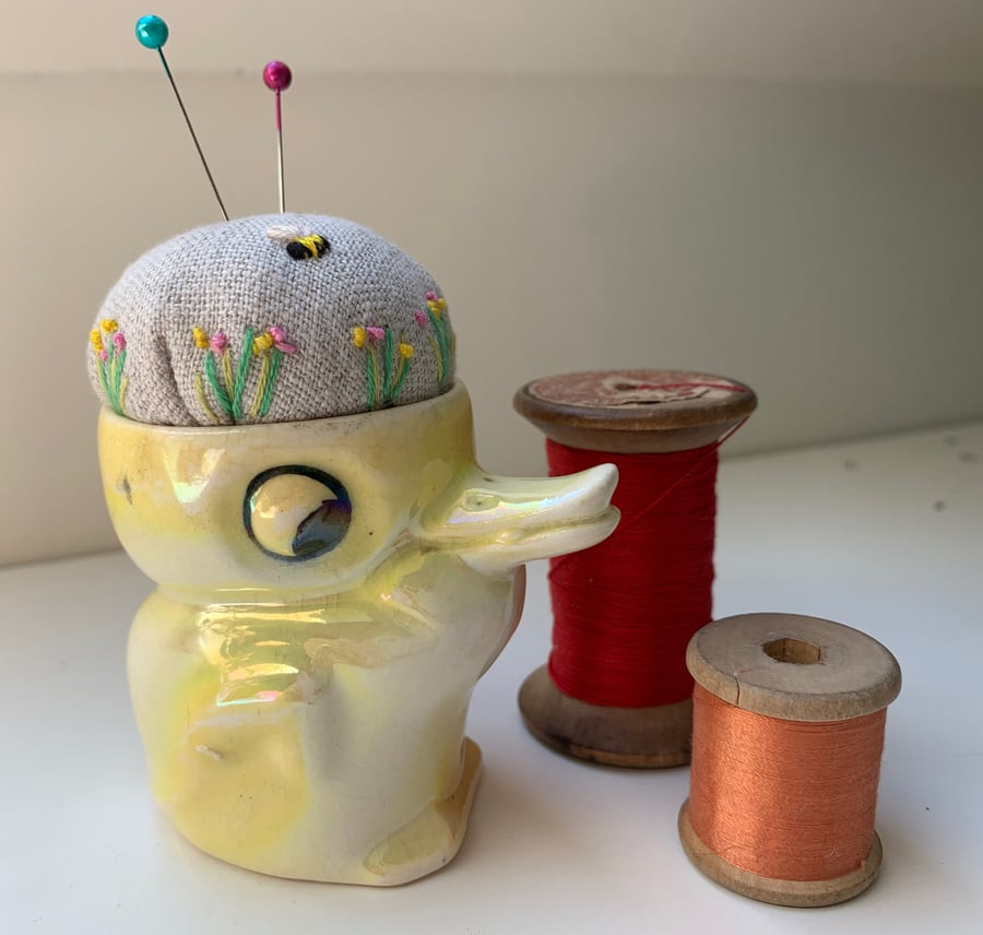 Duckling egg cup pincushion