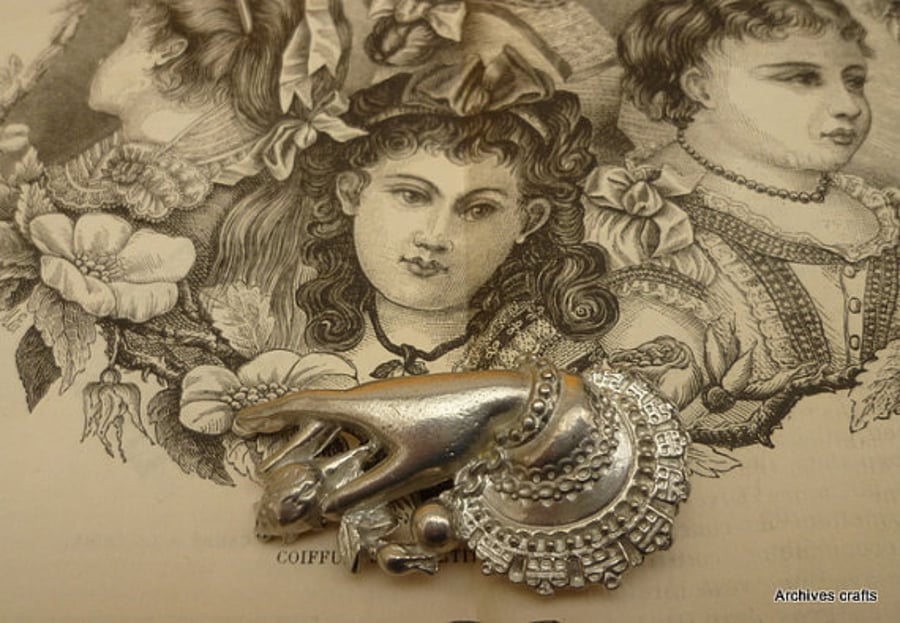 Victorian hand brooch
