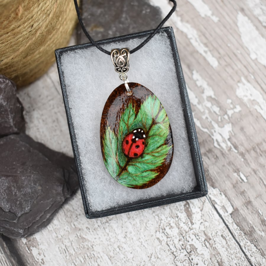 Ladybird on a leaf pyrography pendant. British wildlife gift for gardener.