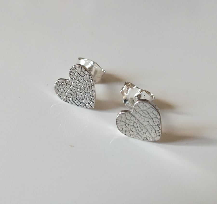 Leaf texture silver heart studs