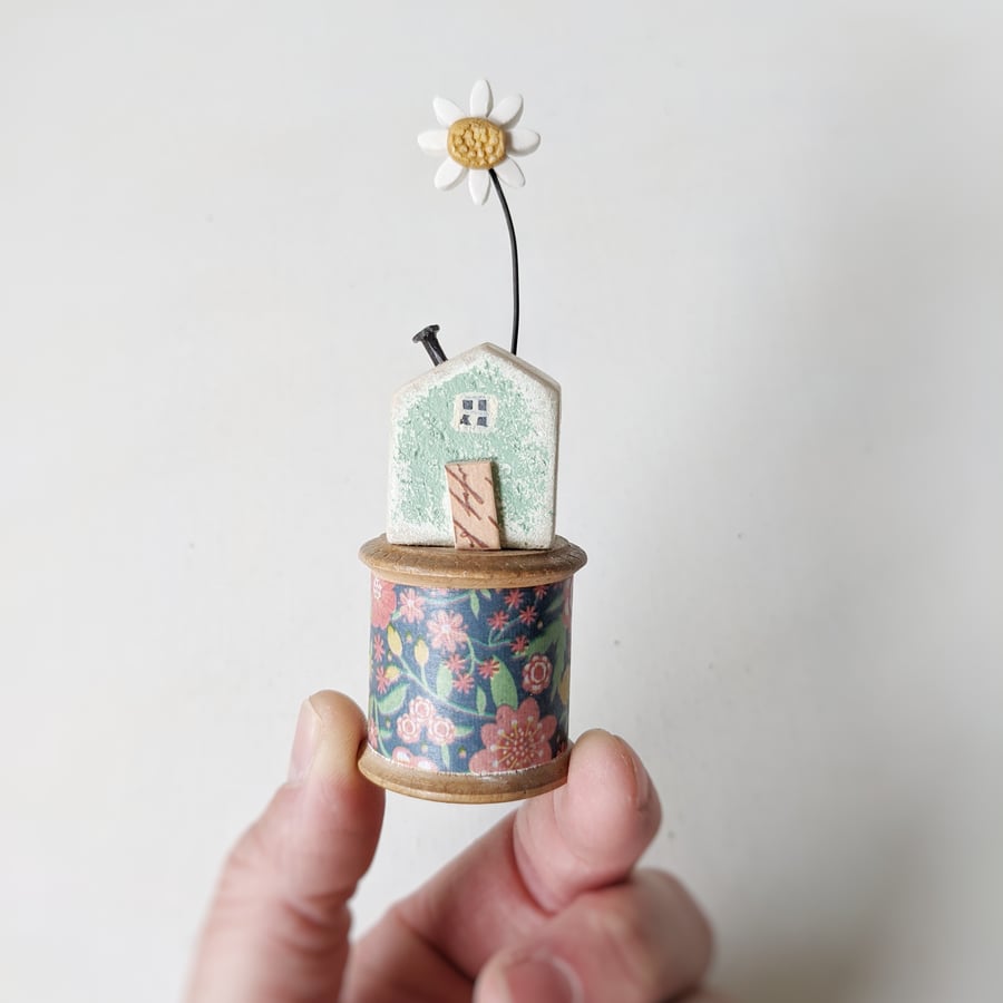 Wooden House on a Vintage Floral Bobbin with Clay Daisy