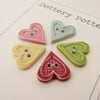 Set of five bright heart ceramic buttons