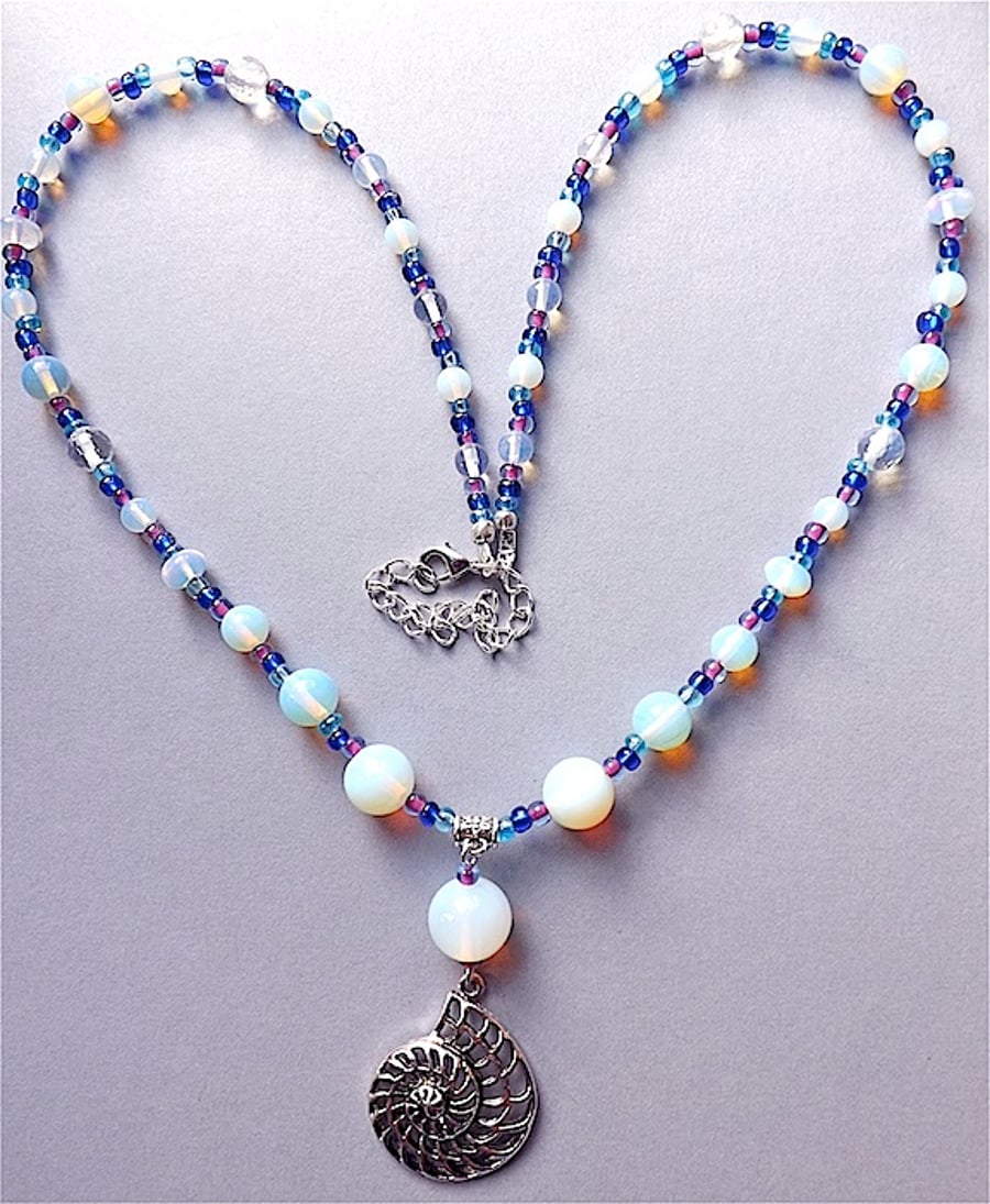Opal moonstone and Tibetan silver Nautilus shell pendant necklace.