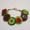 Red, lime and green button bracelet