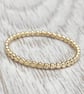 9ct solid yellow gold 1.5mm flat bead skinny ring  - Image 1