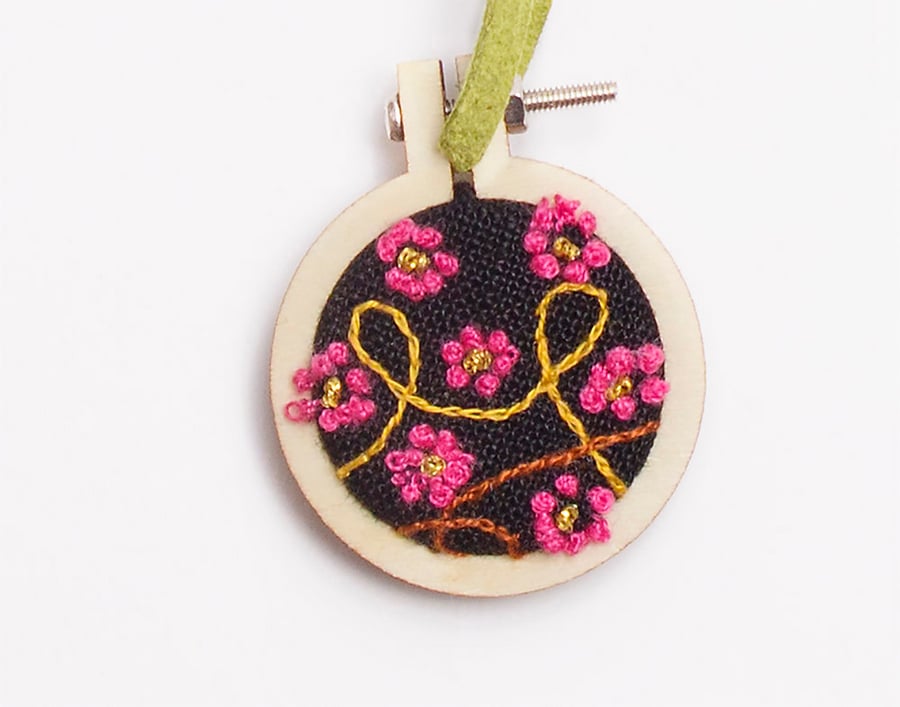 Mini hoop embroidery with hand stitched blossom on black linen