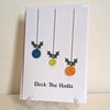 Christmas card with buttons saying Deck the Halls 