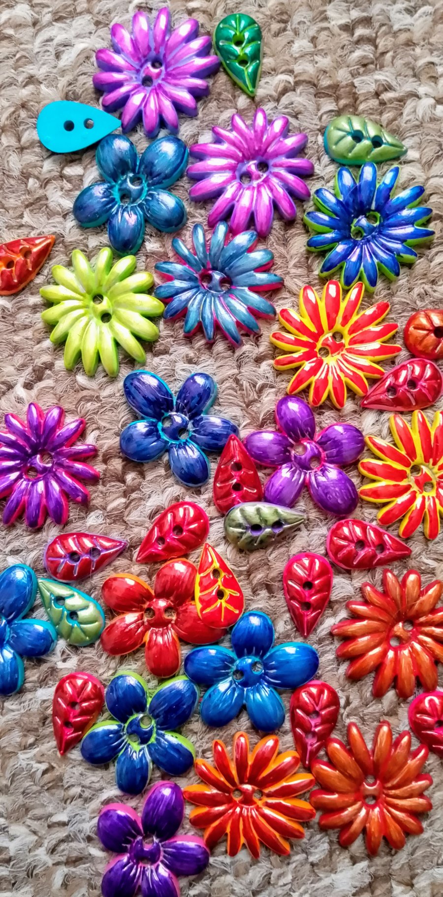 Craft buttons, flowers and leaves.