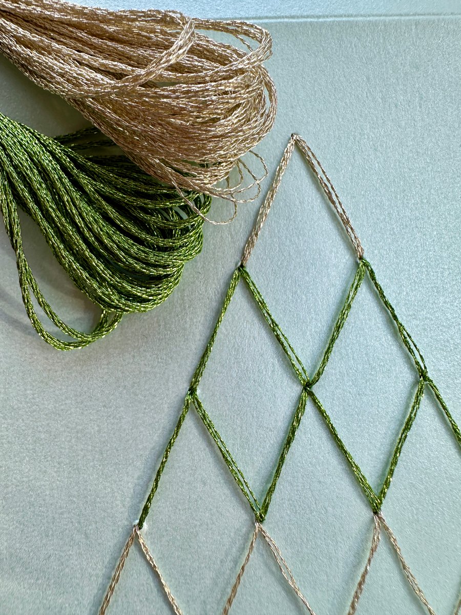 Christmas card of a hand embroidered and beaded tree. Unique luxury modern shiny