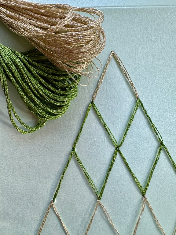 Christmas card of a hand embroidered and beaded tree. Unique luxury modern shiny