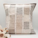 Cream patchwork envelope cushion cover.  