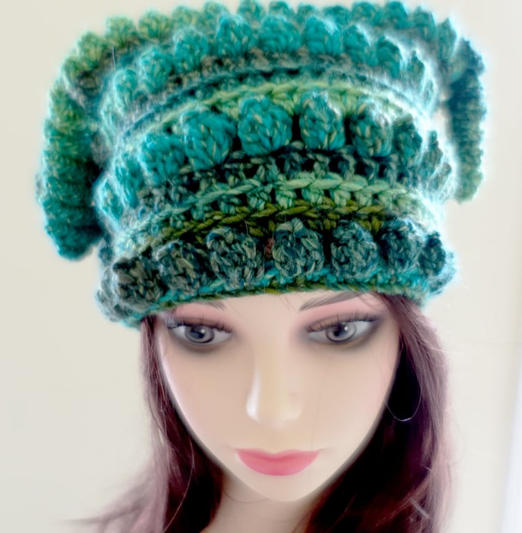 Crochet festival hat in deep emerald green.  Curly tassels.  Warm chunky acrylic