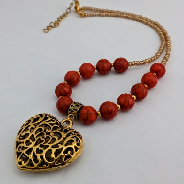 Coral bead necklace with gold filigree puffed heart pendant - 1002514H