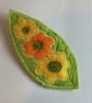 Large felt brooch, flowers on green leaf. - Image 1
