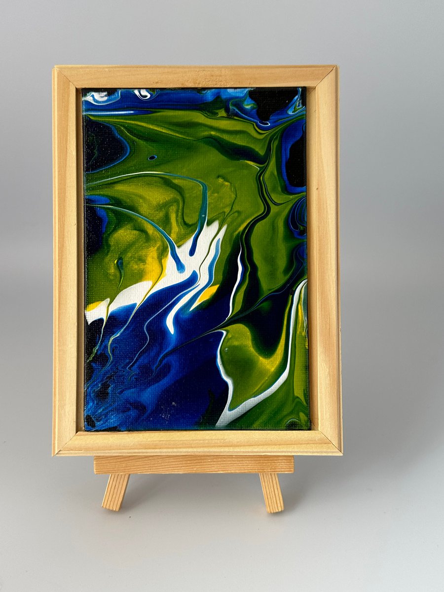 Green and yellow acrylic pour abstract painting