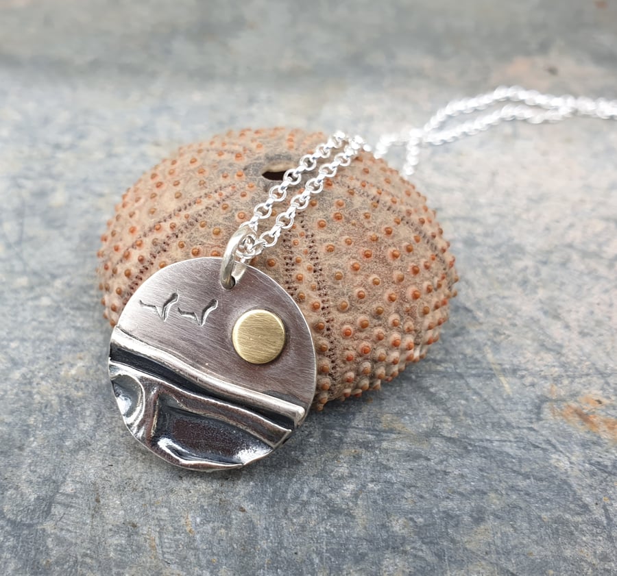 Silver coastal sea landscape pendant 