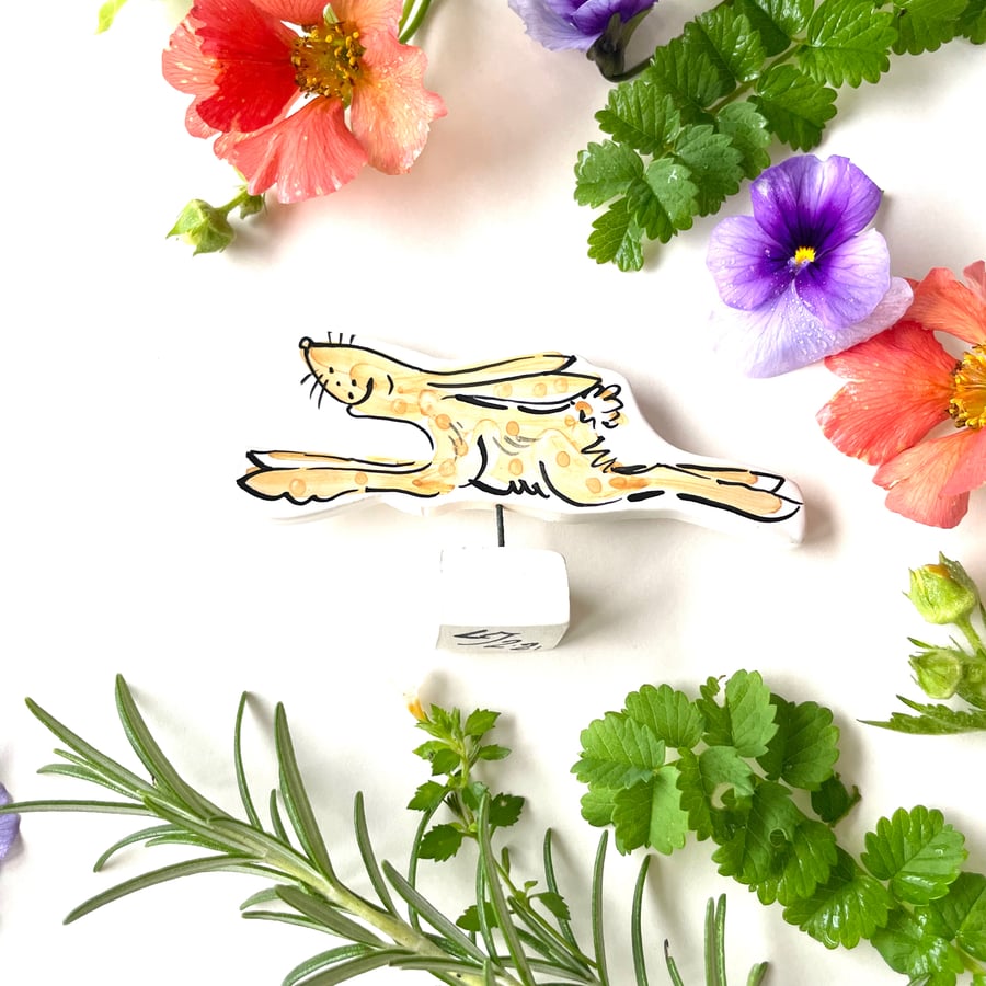 Hare skipping ceramic ornament