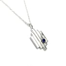 Silver Skyline pendant necklace with blue sapphire