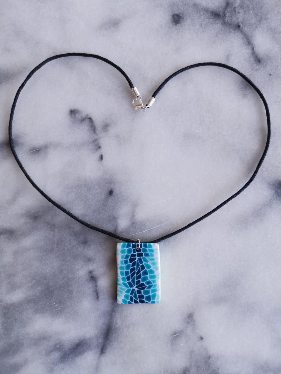 Blue and white rectangular polymer clay pendant