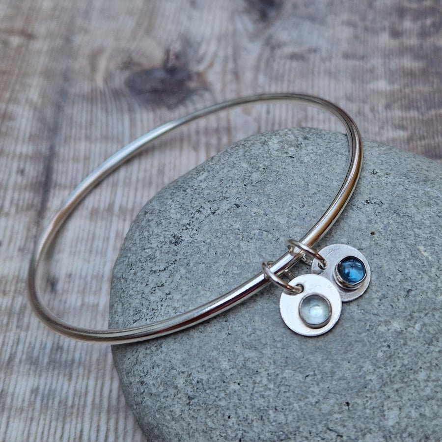 Sterling Silver Round Bangle with Aquamarine and Topaz Charms