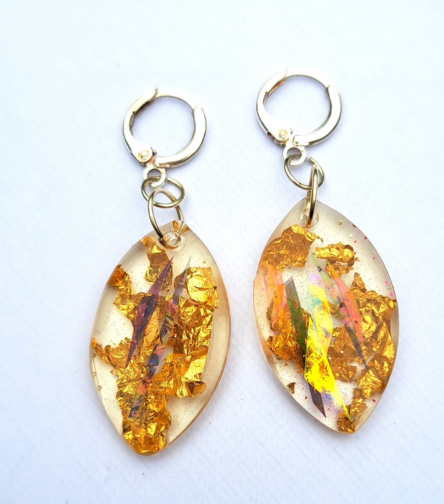Oval shaped resin earrings with dichroic film and gold leaf