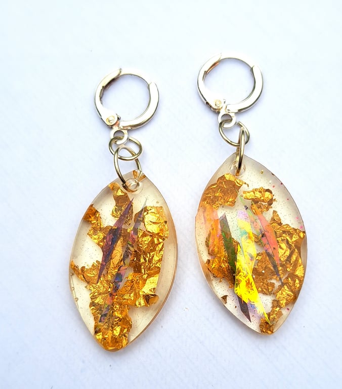 Oval shaped resin earrings with dichroic film and gold leaf