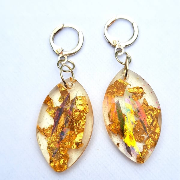 Oval shaped resin earrings with dichroic film and gold leaf