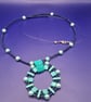 Handmade Beaded Necklace in Turquoise and Petrol Blue with Circular Pendant
