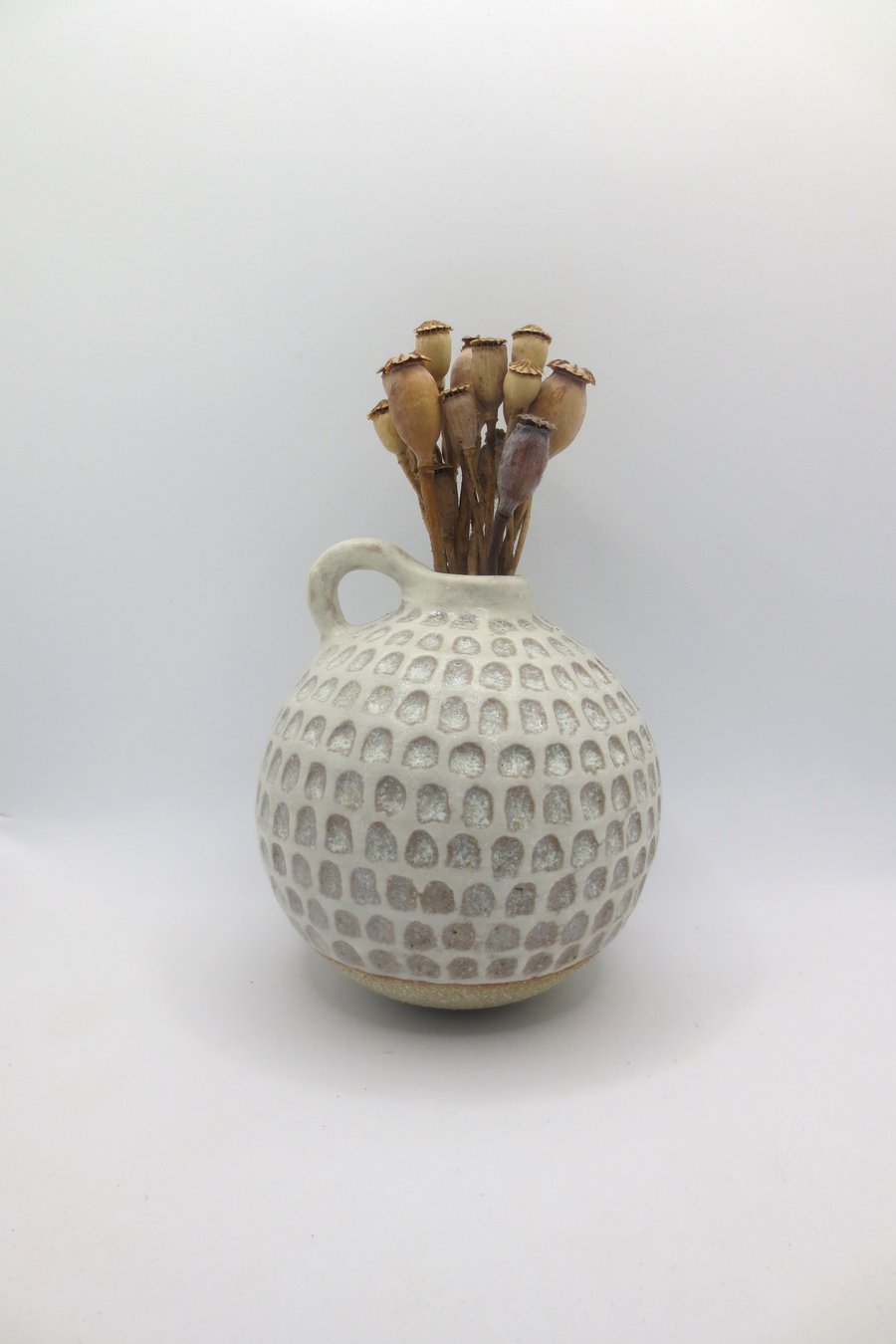 Hand-built stoneware pottery textured vase in white